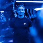 Portrait of a professional male fitness coach smiling